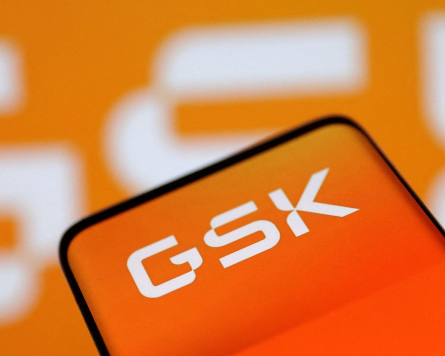 FILE PHOTO: GSK (GlaxoSmithKline) logo is seen in this illustration, August 10, 2022. REUTERS/Dado Ruvic/Illustration